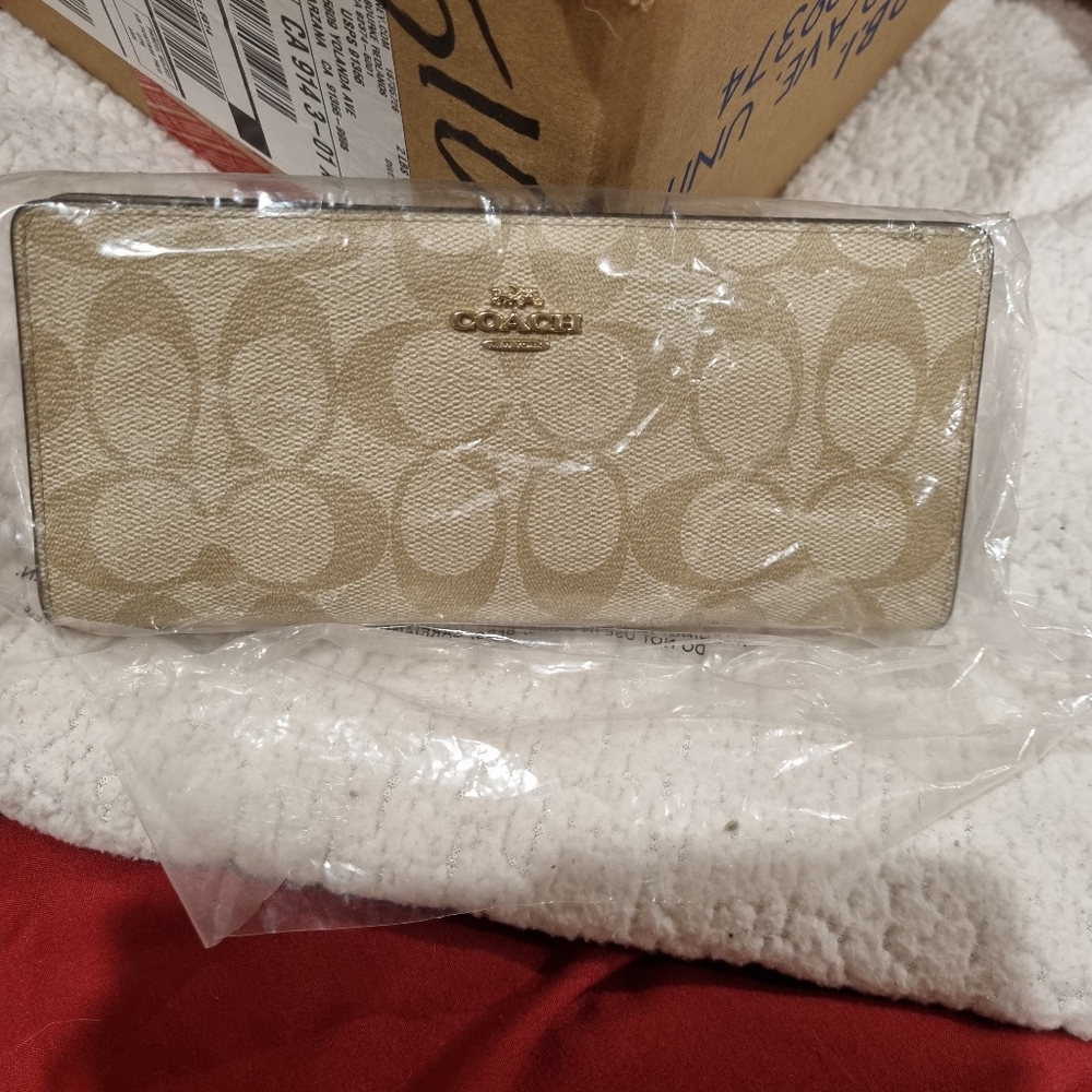 New thin coach wallet